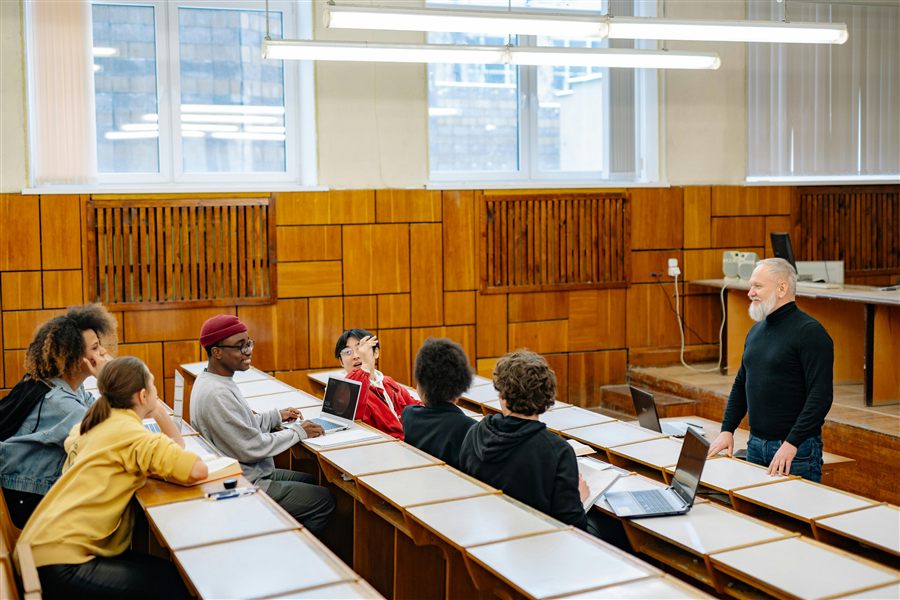 Students in a classroom discussion with an instructor